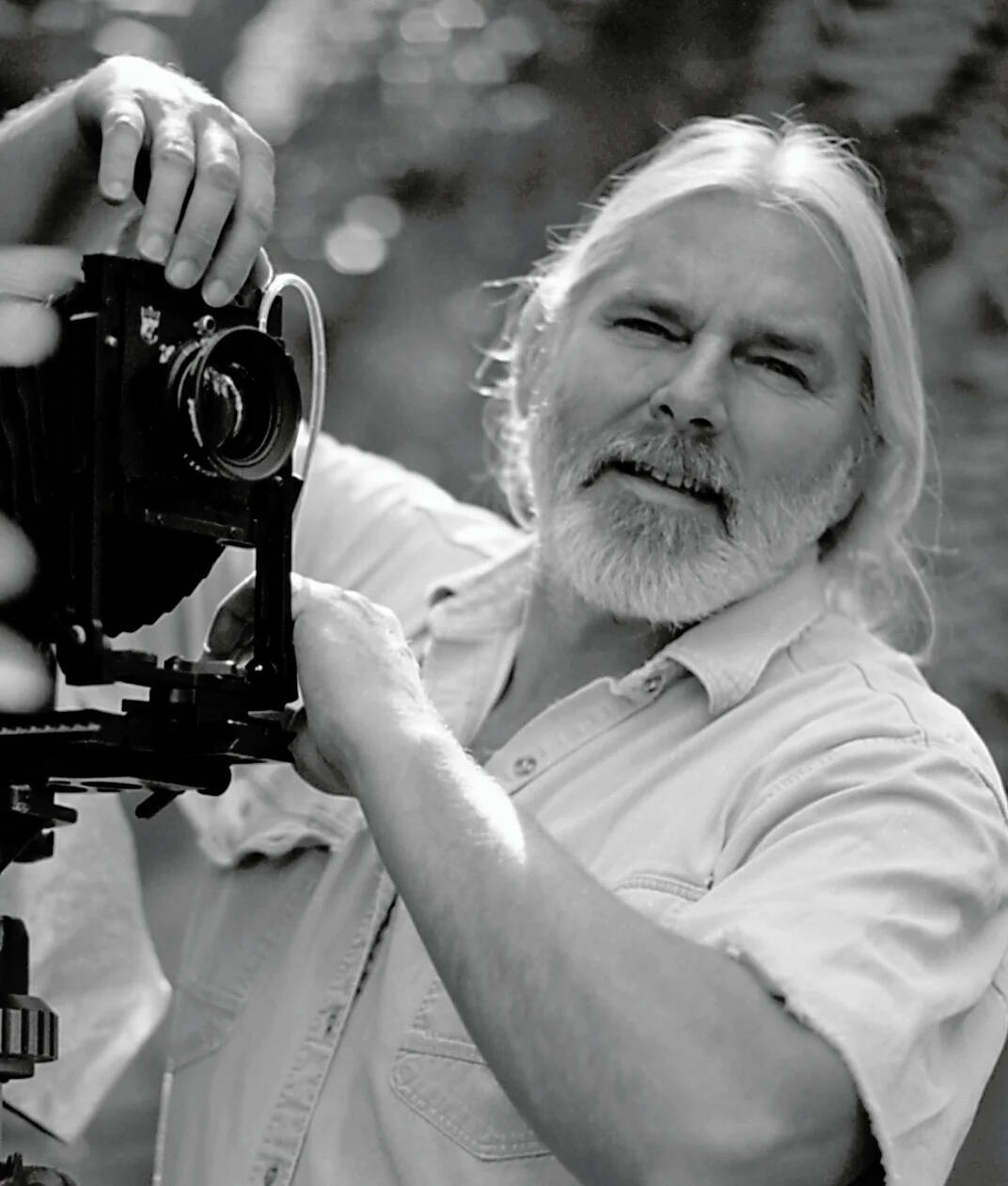 Black and white photograph of photographer David Lubbers.